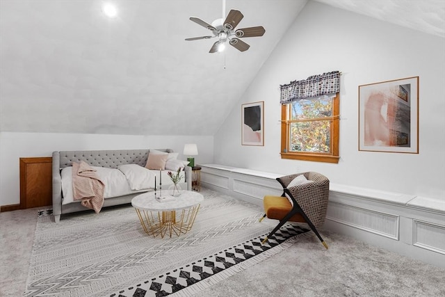 carpeted bedroom with ceiling fan and lofted ceiling