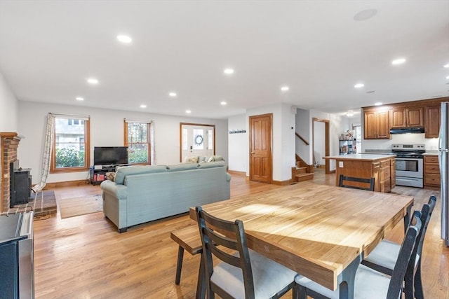 dining room featuring light hardwood / wood-style flooring