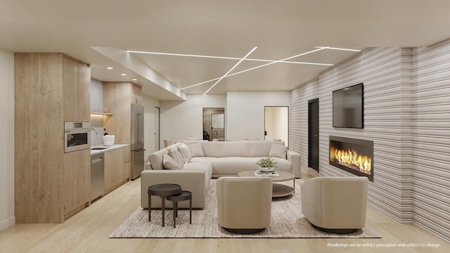 118 Prospect St Unit 306, Somerville, MA 02143 - living area featuring a glass covered fireplace, light wood-type flooring, and recessed lighting