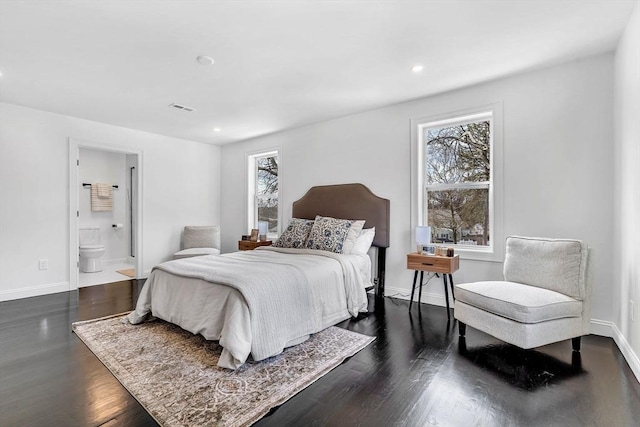 bedroom featuring multiple windows, baseboards, recessed lighting, and dark wood finished floors