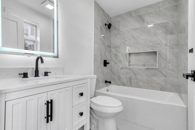 full bath with  shower combination, toilet, and vanity