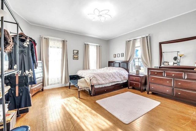 bedroom with light wood-type flooring