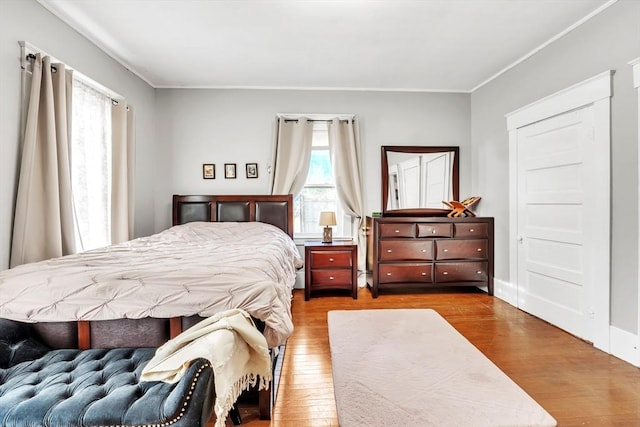 bedroom with light wood-type flooring