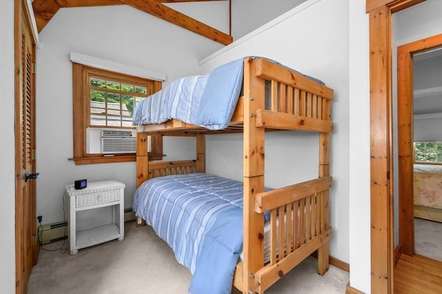 carpeted bedroom featuring a baseboard heating unit, cooling unit, and vaulted ceiling