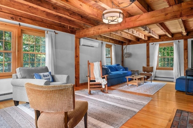 living area featuring wooden ceiling, a baseboard radiator, wood finished floors, a wall mounted air conditioner, and beam ceiling