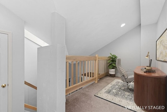 home office featuring carpet flooring and lofted ceiling