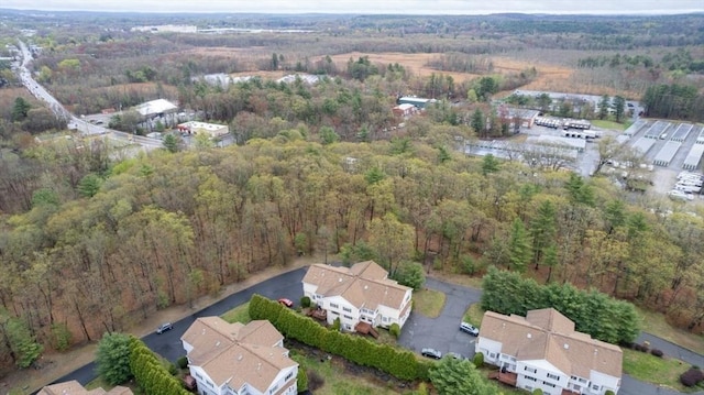 aerial view with a wooded view