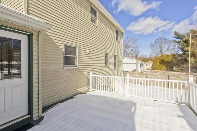 view of patio / terrace featuring a deck and fence