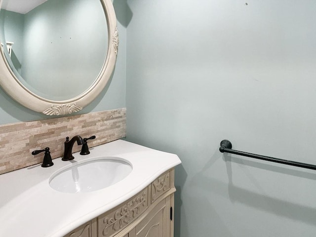 7 Nirvana Dr, Saugus, MA 01906 - bathroom featuring decorative backsplash and vanity