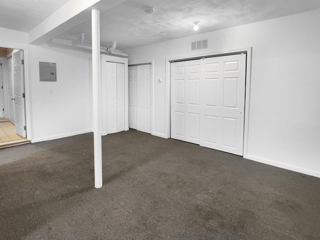7 Nirvana Dr, Saugus, MA 01906 - below grade area featuring carpet flooring, electric panel, and baseboards