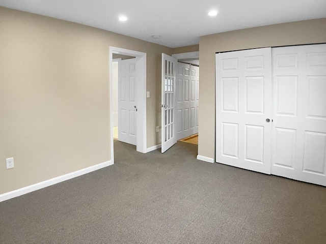 7 Nirvana Dr, Saugus, MA 01906 - unfurnished bedroom featuring dark colored carpet, recessed lighting, baseboards, and a closet