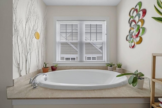 6 Essex Rd Unit 15, Ipswich, MA 01938 - full bath with a healthy amount of sunlight and a bath