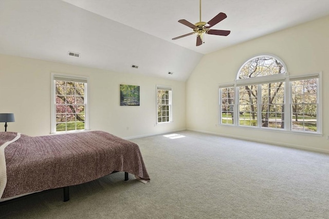 carpeted bedroom with baseboards, ceiling fan, lofted ceiling, and visible vents