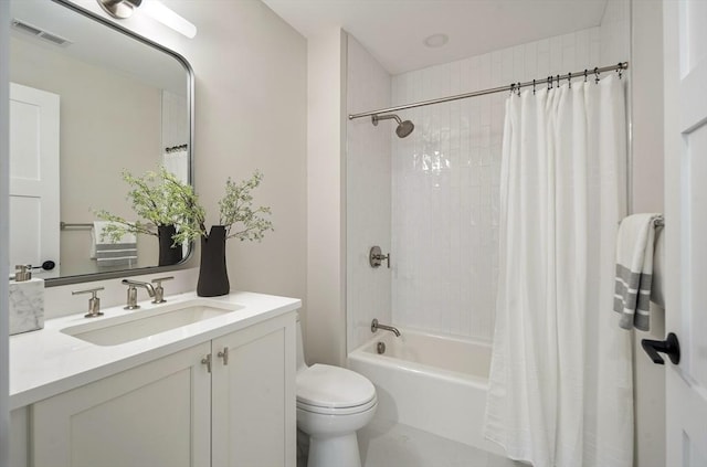 full bathroom featuring toilet, vanity, and shower / bathtub combination with curtain