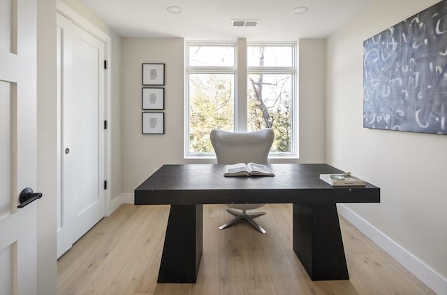 office space featuring light wood-type flooring