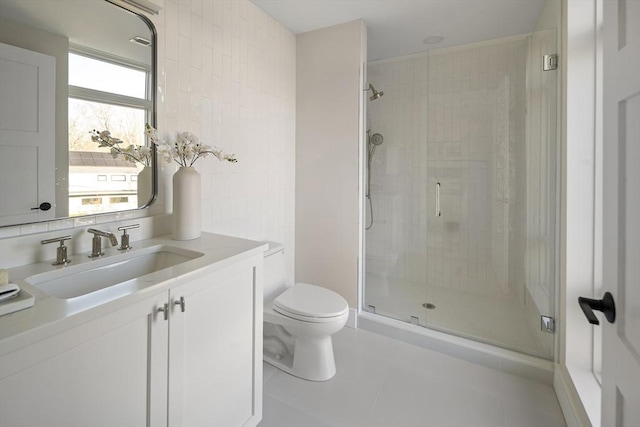 bathroom featuring tile patterned flooring, decorative backsplash, toilet, and walk in shower