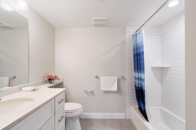 full bathroom with shower / tub combo, vanity, toilet, and baseboards