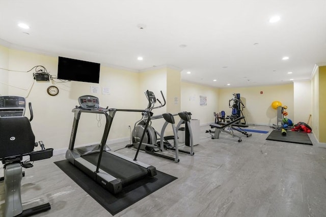 exercise area with baseboards and recessed lighting