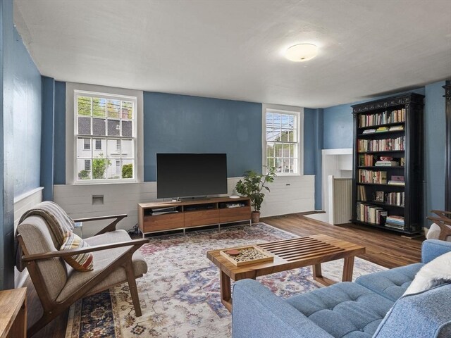 living room with wood finished floors