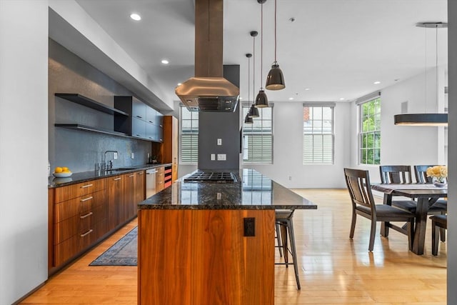618 E 2nd St Unit 2, Boston, MA 02127 - kitchen featuring a center island, appliances with stainless steel finishes, modern cabinets, a breakfast bar area, and recessed lighting