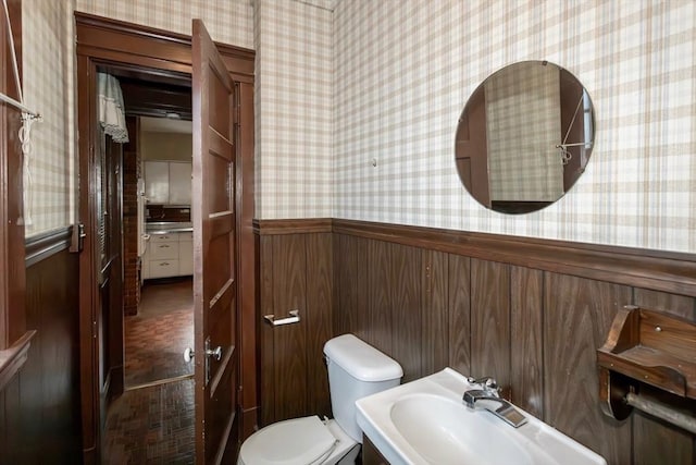 bathroom with sink and toilet