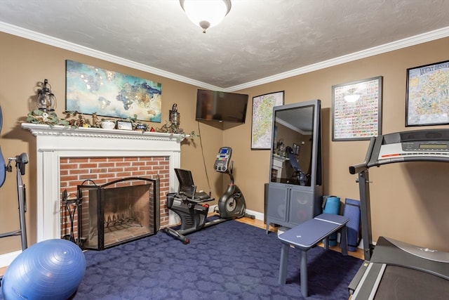 exercise area with crown molding, dark carpet, and a fireplace