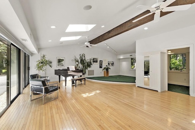 157 Carleton Rd, Carlisle, MA 01741 - recreation room featuring light wood-style flooring, a skylight, a ceiling fan, baseboards, and recessed lighting