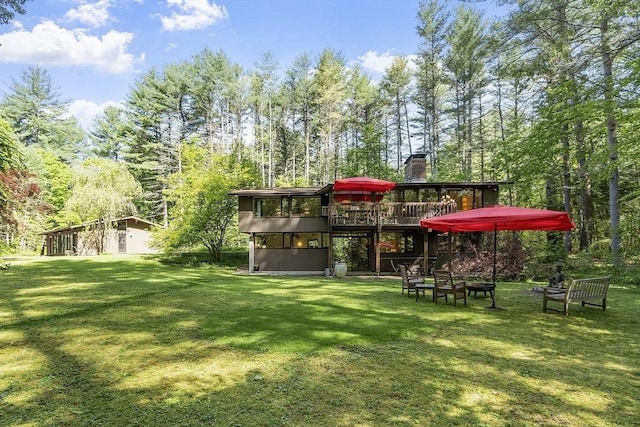 157 Carleton Rd, Carlisle, MA 01741 - view of green lawn featuring a deck