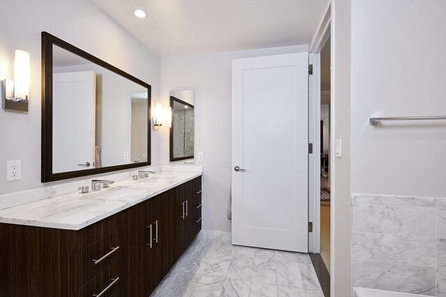 580 Washington St Unit 10A, Boston, MA 02111 - full bath with vanity, marble finish floors, and recessed lighting