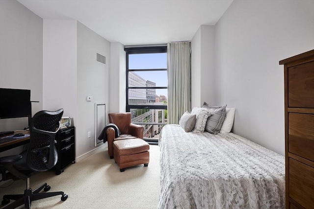 580 Washington St Unit 10A, Boston, MA 02111 - carpeted bedroom with an office area