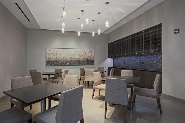 580 Washington St Unit 10A, Boston, MA 02111 - dining space featuring rail lighting and light wood-type flooring