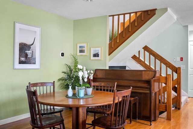 dining area featuring wood-type flooring