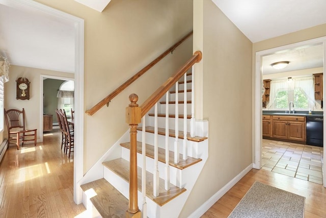 232 Wallum Lake Rd, Douglas, MA 01516 - staircase with wood finished floors and baseboards