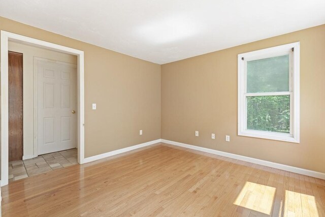 232 Wallum Lake Rd, Douglas, MA 01516 - empty room with light wood-style flooring