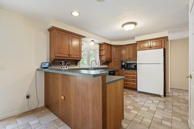 232 Wallum Lake Rd, Douglas, MA 01516 - kitchen featuring freestanding refrigerator, open shelves, black microwave, brown cabinets, and a peninsula