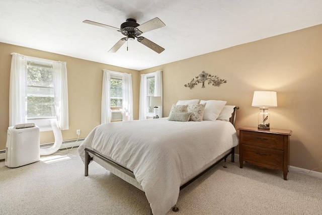 232 Wallum Lake Rd, Douglas, MA 01516 - bedroom featuring light carpet, ceiling fan, and a baseboard radiator