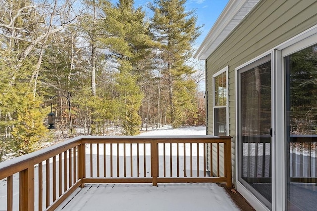 view of snow covered deck