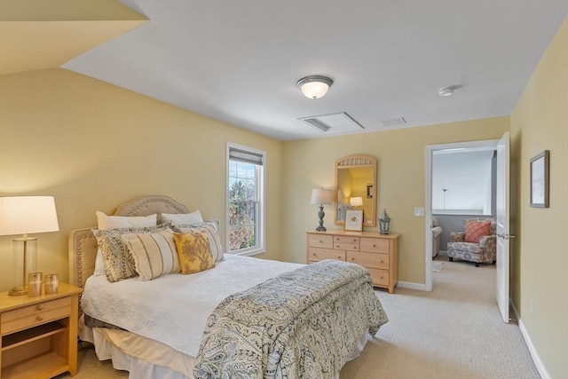 bedroom featuring vaulted ceiling and light colored carpet