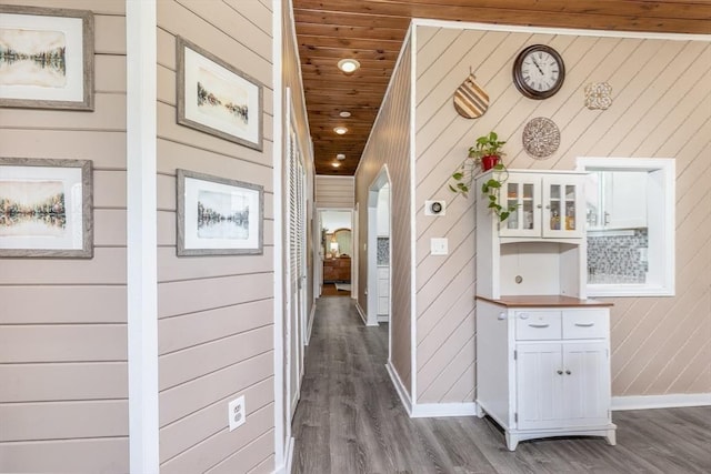 65 Water St Unit 2, Danvers, MA 01923 - corridor featuring wood finished floors, wood walls, wood ceiling, arched walkways, and recessed lighting