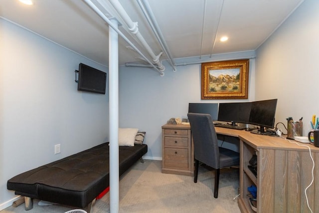 office featuring light carpet and baseboards