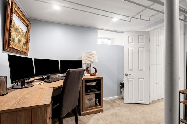 office area featuring light carpet