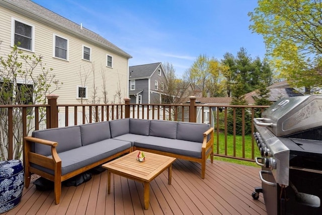 deck with area for grilling and an outdoor living space