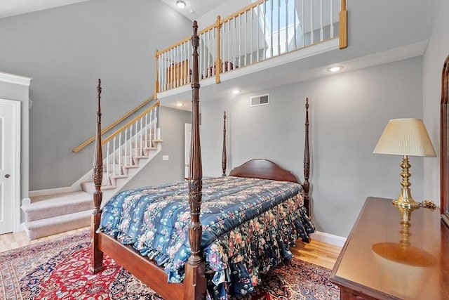 38 Tarbell St Unit 1B, Pepperell, MA 01463 - bedroom with a high ceiling, wood finished floors, baseboards, and recessed lighting