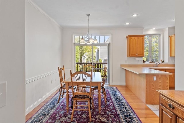 38 Tarbell St Unit 1B, Pepperell, MA 01463 - dining area with a chandelier, ornamental molding, light wood finished floors, and recessed lighting