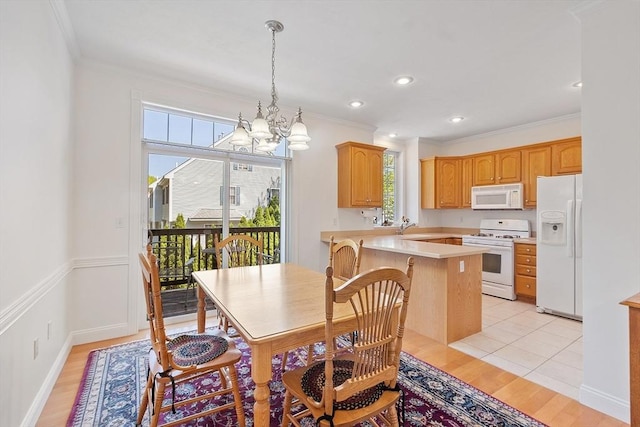 38 Tarbell St Unit 1B, Pepperell, MA 01463 - dining area with crown molding, a chandelier, light wood finished floors, and recessed lighting