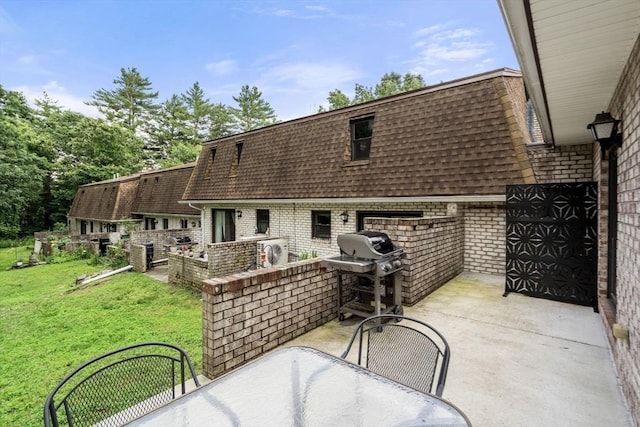 70 Granby Hts Unit 70, Granby, MA 01033 - view of patio / terrace with an outdoor kitchen and outdoor dining space