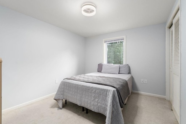 70 Granby Hts Unit 70, Granby, MA 01033 - carpeted bedroom featuring a closet and baseboards