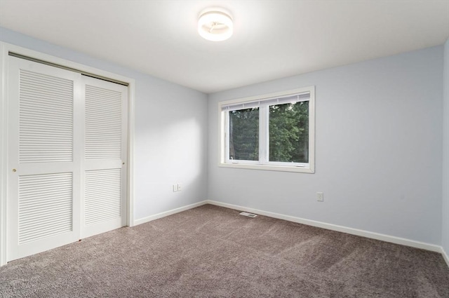 70 Granby Hts Unit 70, Granby, MA 01033 - unfurnished bedroom with carpet flooring and a closet