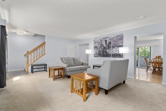 70 Granby Hts Unit 70, Granby, MA 01033 - living area with light carpet and stairs