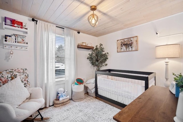 bedroom featuring wood ceiling